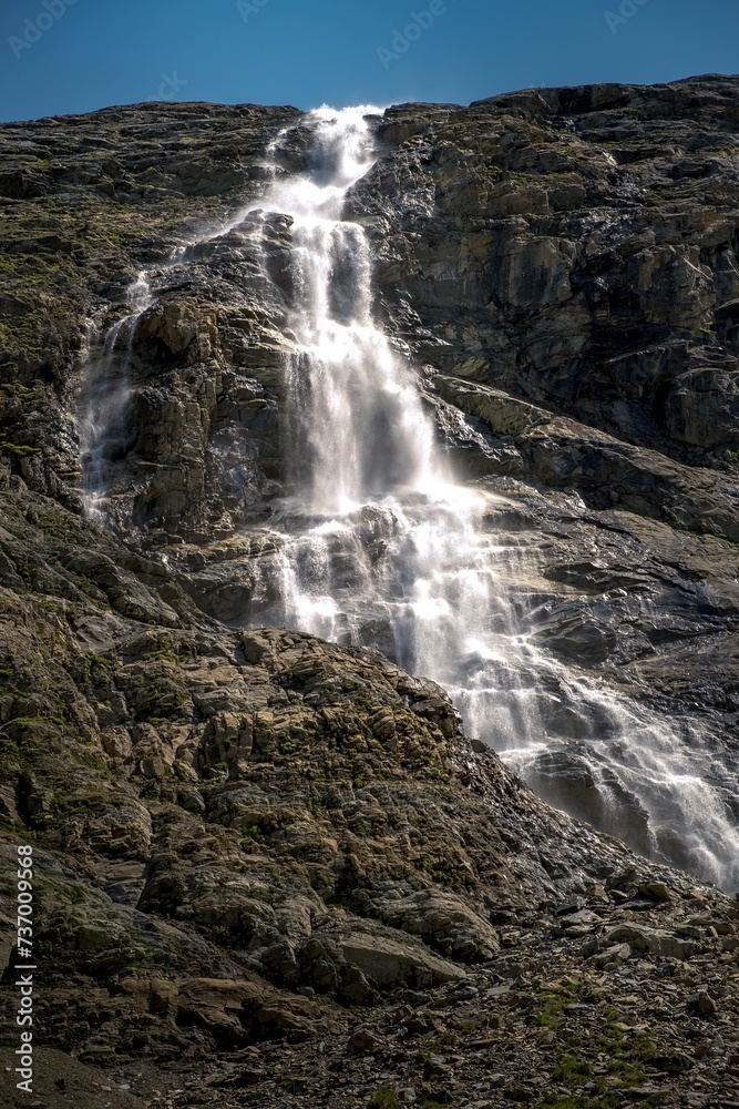 Obraz premium Alpine panorama with waterfall during the summer in the South Tyrol