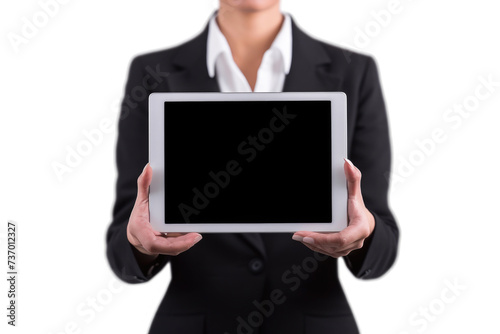 Professional woman dressed in business suit holding tablet computer. Suitable for use in corporate, technology, and communication-related projects
