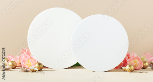 Canvas Print Empty round podium, easter gold eggs with spring tulip flowers on a pink backgro
