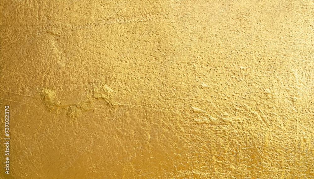 Gold cement wall texture background; golden color; modern trendy surface Gold cement wall texture background; golden color; modern trendy surface