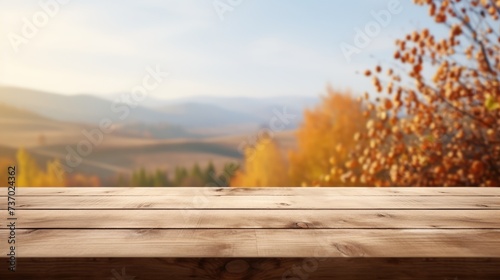 Empty wooden table with autumn landscape banner.