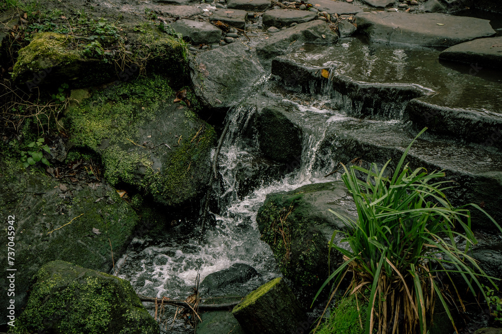 Fototapeta premium High anfle view of stream against rocks