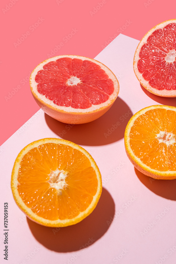 Creative fruit composition on pink background with hard shadows. Summer minimal concept. Creative fruit composition on pink background with hard shadows. Summer minimal concept.
