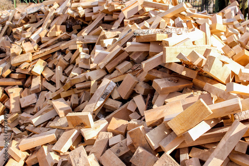 A lot of birch bars. Firewood for firebox photo