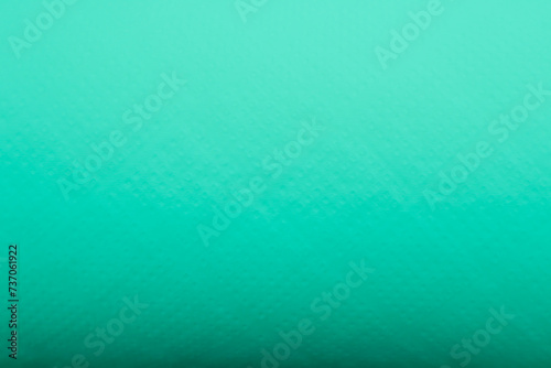 Light gradient paper backdrop, trendy turquoise color. Textures formed by cardboard or paper ancient of color.