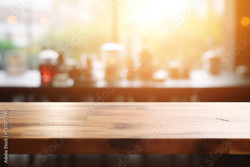 beautiful brown wood table top kitchen interior background and blurred defocused with daylight flare bokeh, product montage display 