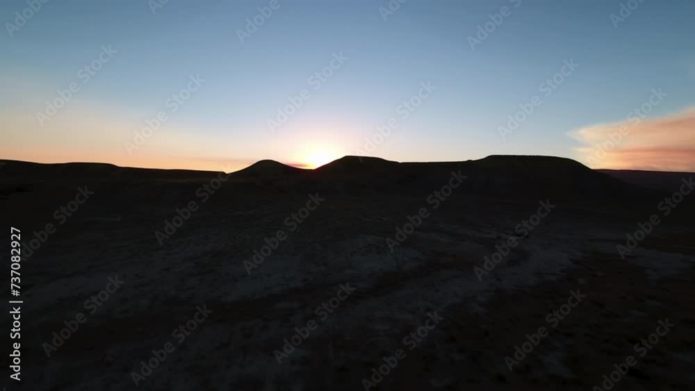 Aerial Silhouette Of Mountains In Semi Arid Desert, Drone Flying Forward During Tranquil Sunset - Moab, Utah Aerial Silhouette Of Mountains In Semi Arid Desert, Drone Flying Forward During Tranquil Sunset - Moab, Utah