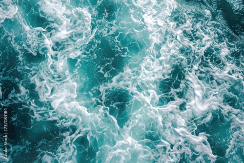 Turquoise ocean waves in aerial view. © darshika