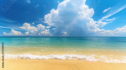 Sandy Beach With Blue Sky and White Clouds