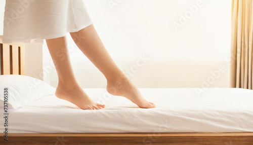 Female Foot Relax Concept.Woman Body Legs Bed Awaking Morning Relax Step.Side view.Copy space.