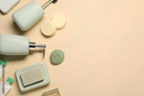 Fototapeta Naklejka Na Ścianę i Meble -  Bath accessories. Flat lay composition with personal care products on beige background, space for text