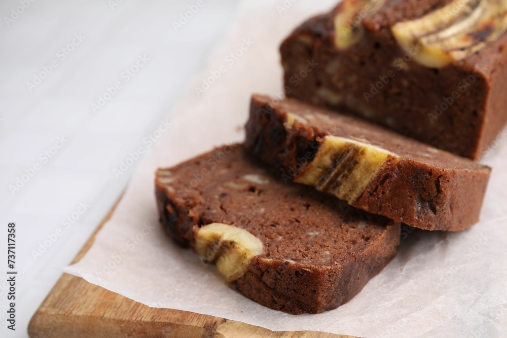 Delicious homemade banana bread on table, closeup. Space for text Delicious homemade banana bread on table, closeup. Space for text