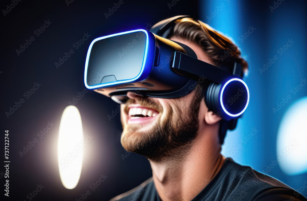 Cheerful man wearing virtual reality VR goggles, close-up. Cheerful man wearing virtual reality VR goggles, close-up.