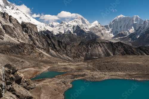 Alpine lakes, Mounts Lhotse, Makalu, Baruntse and Chukchung Glacier from Kongma La Pass during Everest Base Camp EBC or Three Passes trekking in Khumjung, Nepal. Highest mountains in the world.