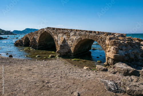 Obraz na płótnie Ancient stone bridge in Argassi beach in Zakinthos , Greece. Argássi Bridge constructed in 1885. w salonie