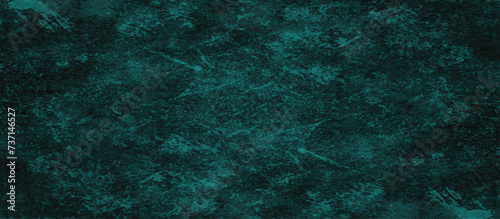 Abstract green concrete wall texture background. old black and green grunge background texture. rock textured or marbled stone banner with elegant mottled dark and light blue green color and design.