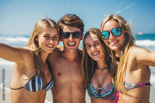Young attractive friends having fun the summer beach © Fabio