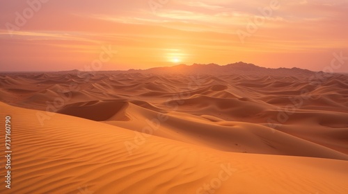 the sun is setting in the distance over a desert landscape with sand dunes and a mountain range in the distance.