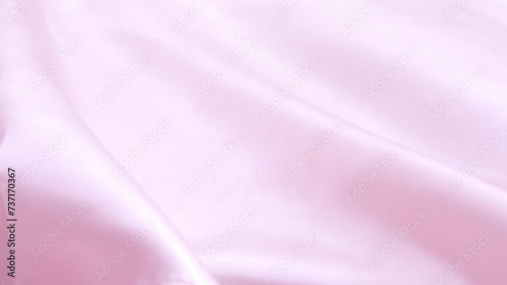 elegant delicate silk texture in pink pastel color, dusty rose with soft, slight movement of gentle folds, interior design concept, silk cloth background, copy space for designer, text mockup