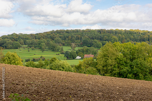 Summer landscape view, Hilly countryside of Zuid-Limburg with small villages on the hillside, farmland and forest, Epen is a village in the southern part of the Dutch province of Limburg, Netherlands.