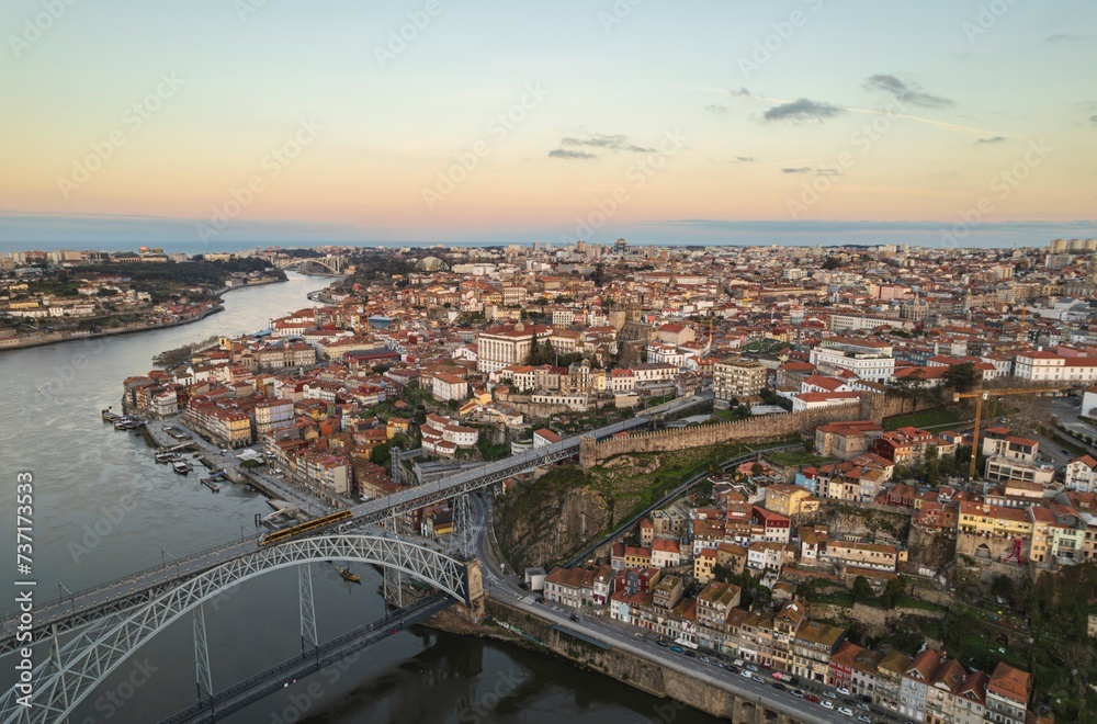 Elevating Horizons: A Mesmerizing Vista of a Thriving Metropolis and the Architectural Marvel of Dom Lus I Bridge.