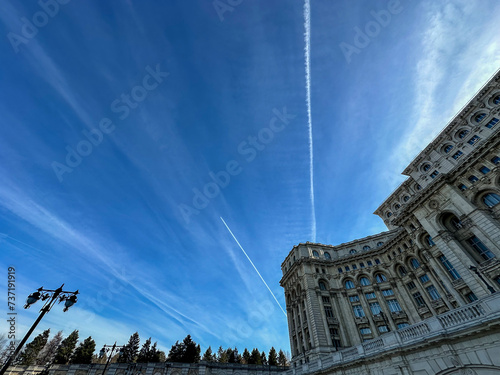 the palace of the parliament in Bucharest. Exterior of Romania's Palace of Parliament, known as House of the People. detail. blue sky photo. photo