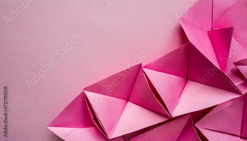 pink origami paper background with copy space for text or image