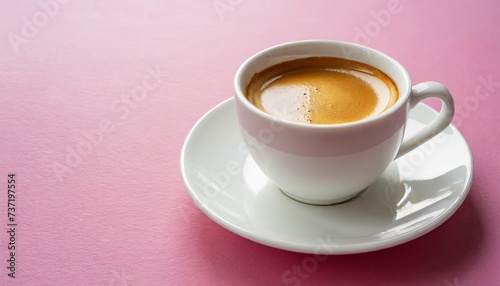 white cup of coffee espresso isolated on pink background