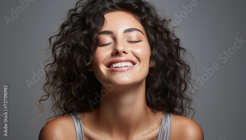 Young woman with curly brown hair smiling, looking at camera generated by AI
