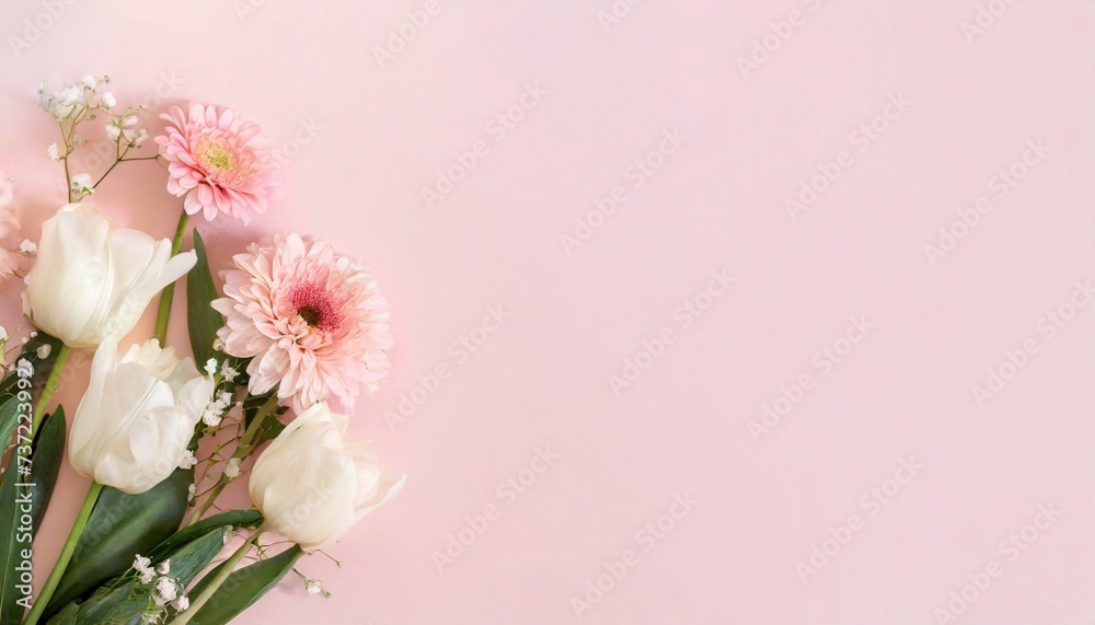 Beautiful spring flowers on light pink background. Top view Beautiful spring flowers on light pink background. Top view
