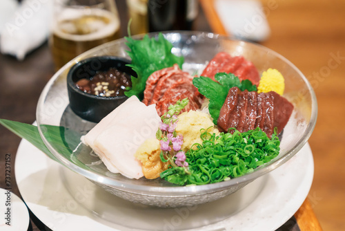 horse meat pieces sashimi or Japanese Basashi. Baniku includes lean meat, superb marbling, mane and liver. Premium meat and famous food in Matsumoto city, Nagano Prefecture, Japan photo