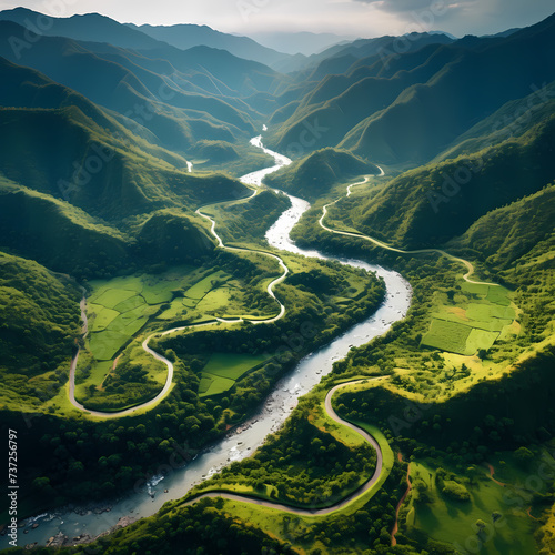 An aerial view of a winding river through a lush valley © Cao