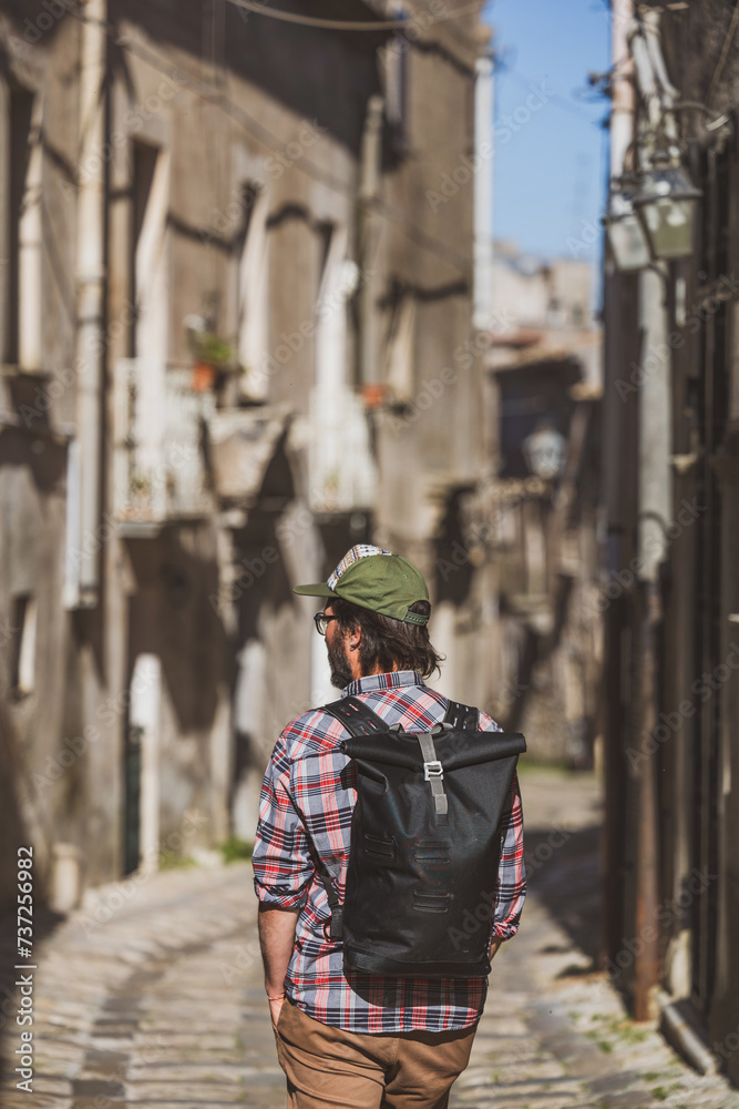 Rear view of a man exploring Italian city Erice
Rear view of a man exploring Italian city Erice