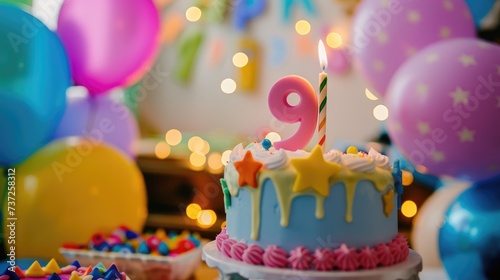 Chocolate children's birthday cake with the number 19candle in the background is a children's playroom birthday