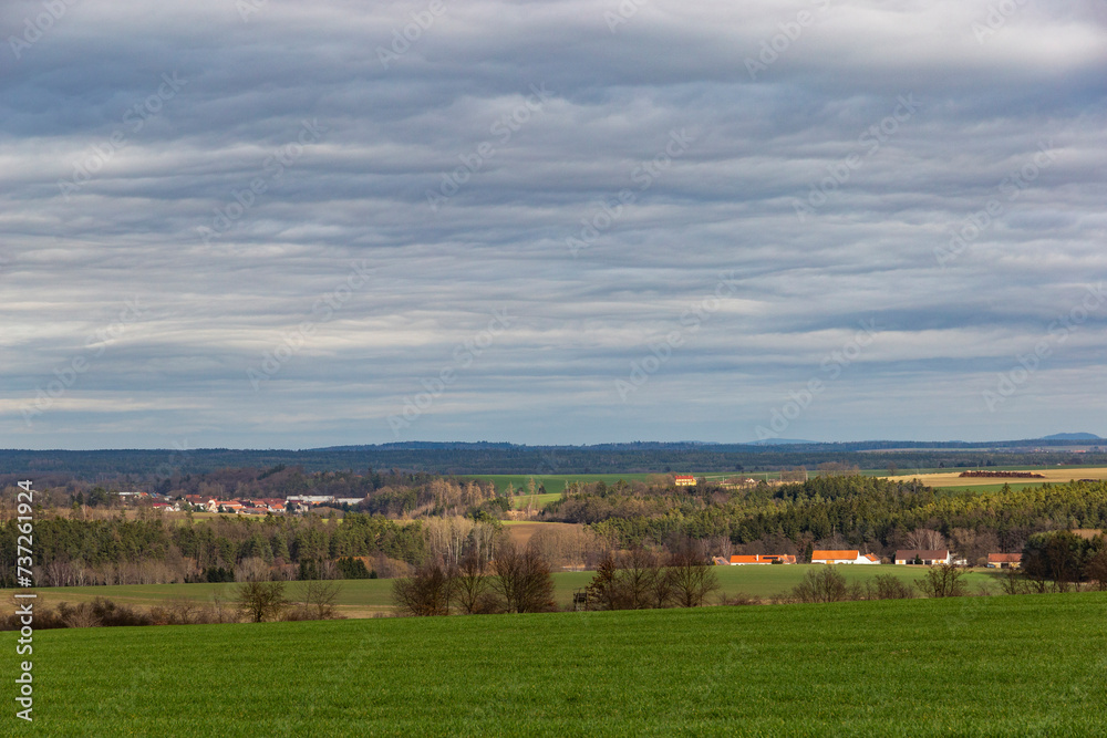 Fototapeta premium Early springtime in European countryside. Villages on the horizon.