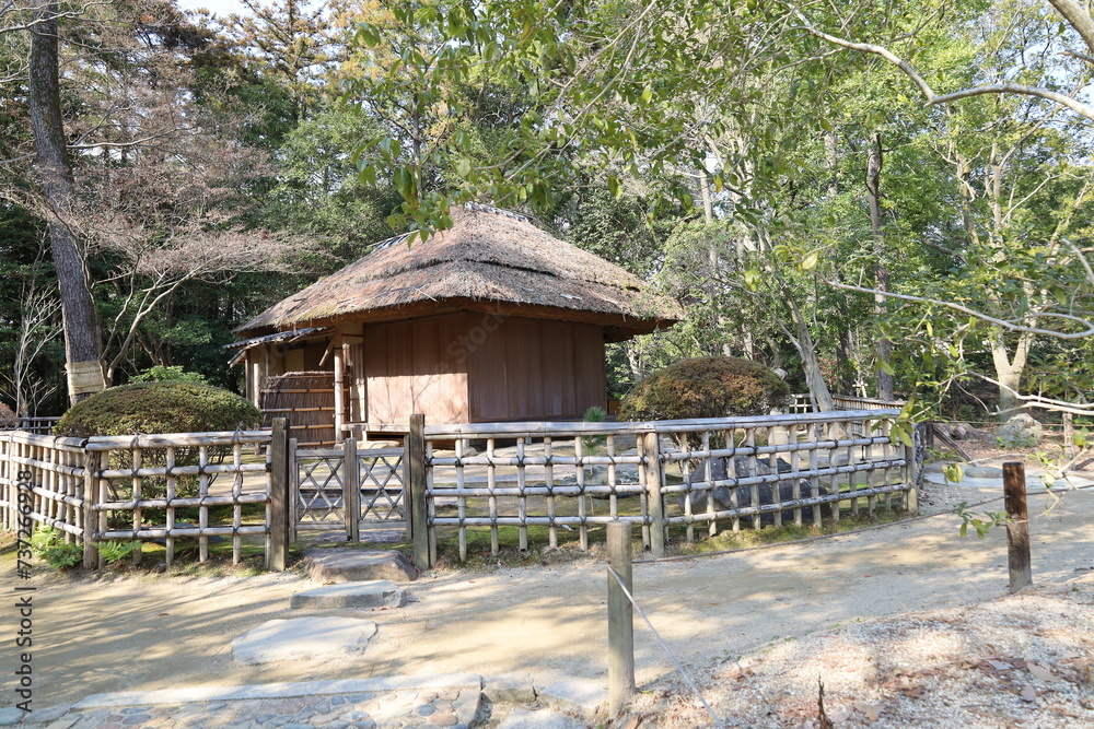 Japanese sentiments : the scene of a Japanese traditional thatched house in Koraku-en Japanese Garden in Okayama City in Okayama Prefecture 日本情緒:岡山県岡山市の後楽園にある日本伝統的茅葺き家屋の風景 Japanese sentiments : the scene of a Japanese traditional thatched house in Koraku-en Japanese Garden in Okayama City in Okayama Prefecture 日本情緒:岡山県岡山市の後楽園にある日本伝統的茅葺き家屋の風景