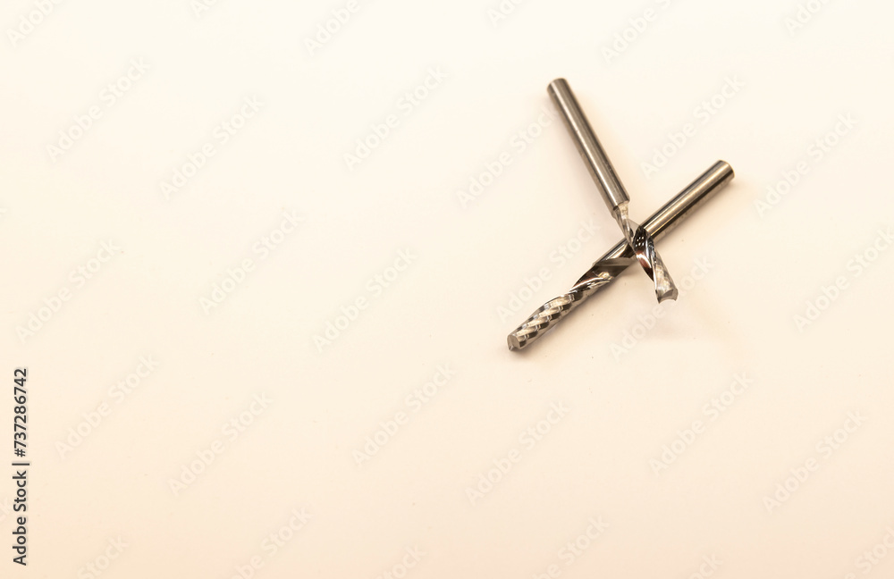single-pass cutters, chips up for CNC processing on a white background
single-pass cutters, chips up for CNC processing on a white background