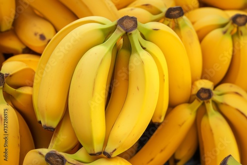 A close-up of ripe, yellow bananas