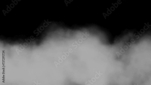 floating smoke fog clouds overlay on black night background. Huge smoke slowly moving on black background. 