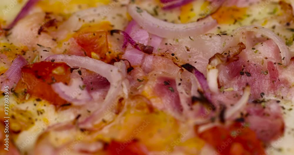 pizza using a large number of different ingredients close-up, background of fresh hot pizza pizza using a large number of different ingredients close-up, background of fresh hot pizza