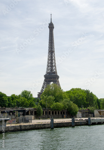 Paris, France, 30 may 2023. Travel in summer on a river boat along the Seine River in the center of city and see the sights, buildings and bridges © ola_pisarenko