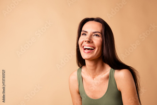 Photo portrait of attractive young woman cheerful smiling model no retouch wear trendy khaki lingerie isolated on beige color background