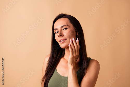Photo of attractive stunning girl touch face enjoy skin after rejuvenation procedure isolated pastel color background