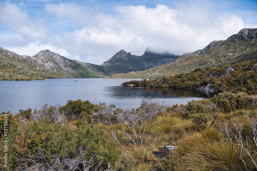 Obraz premium Cradle Mountain Lake St Clair National Park, Tasmania, Australia. Beautiful lake St. Clair is surrounded by hills and mountains. Aboriginal heritage site. Stunning Tasmanian landscapes and nature.