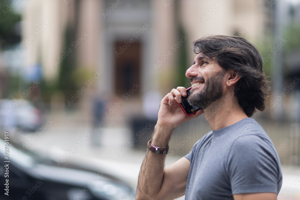 Fototapeta premium View of a young man with smartphone