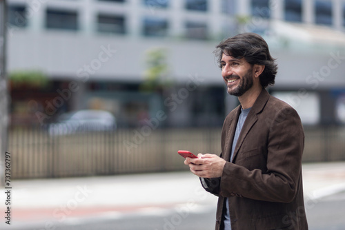 View of a young man with smartphone