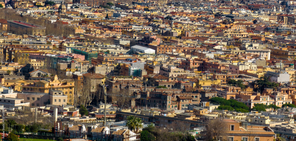 Aerial view on the houses and buildings of the historic center of Rome, Italy.