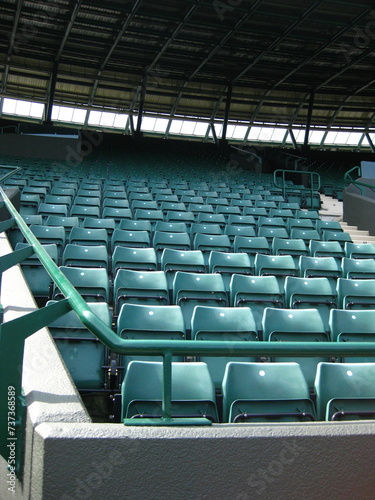 Photo of Empty Seats in a Tennis Court Stadium