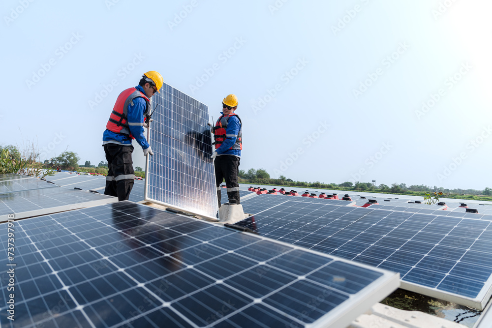 custom made wallpaper toronto digitalPhotovoltaic engineers work on floating photovoltaics. workers Inspect and repair the solar panel equipment floating on water. Engineer working setup Floating solar panels Platform system on the lake.