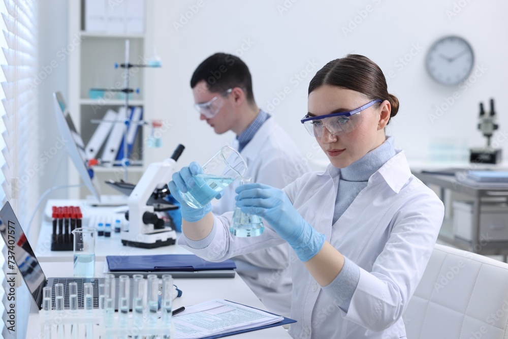 Scientists working with samples in laboratory. Medical research Scientists working with samples in laboratory. Medical research